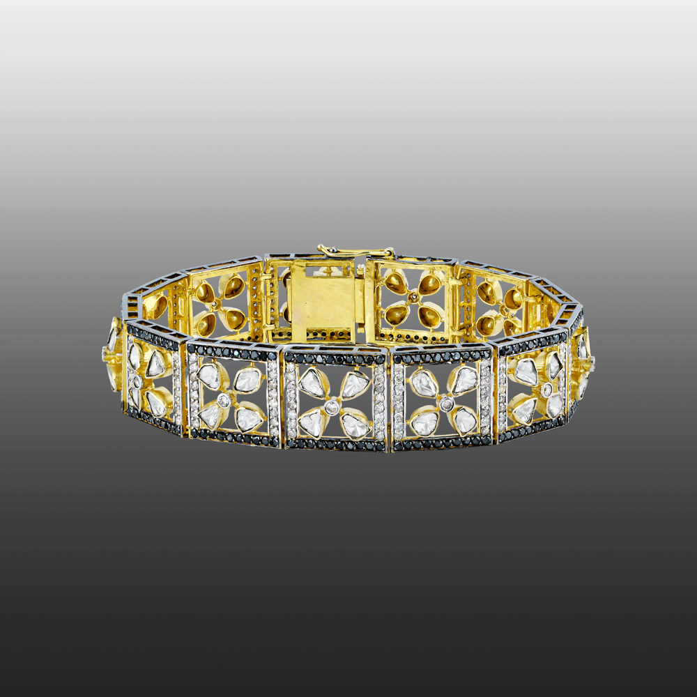 Tennis Bracelet with Floral Polkis and Black Diamond Border